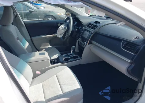 2014 Toyota Camry Le z USA, uszkodzony, nr VIN 4T4BF1FKXER401188